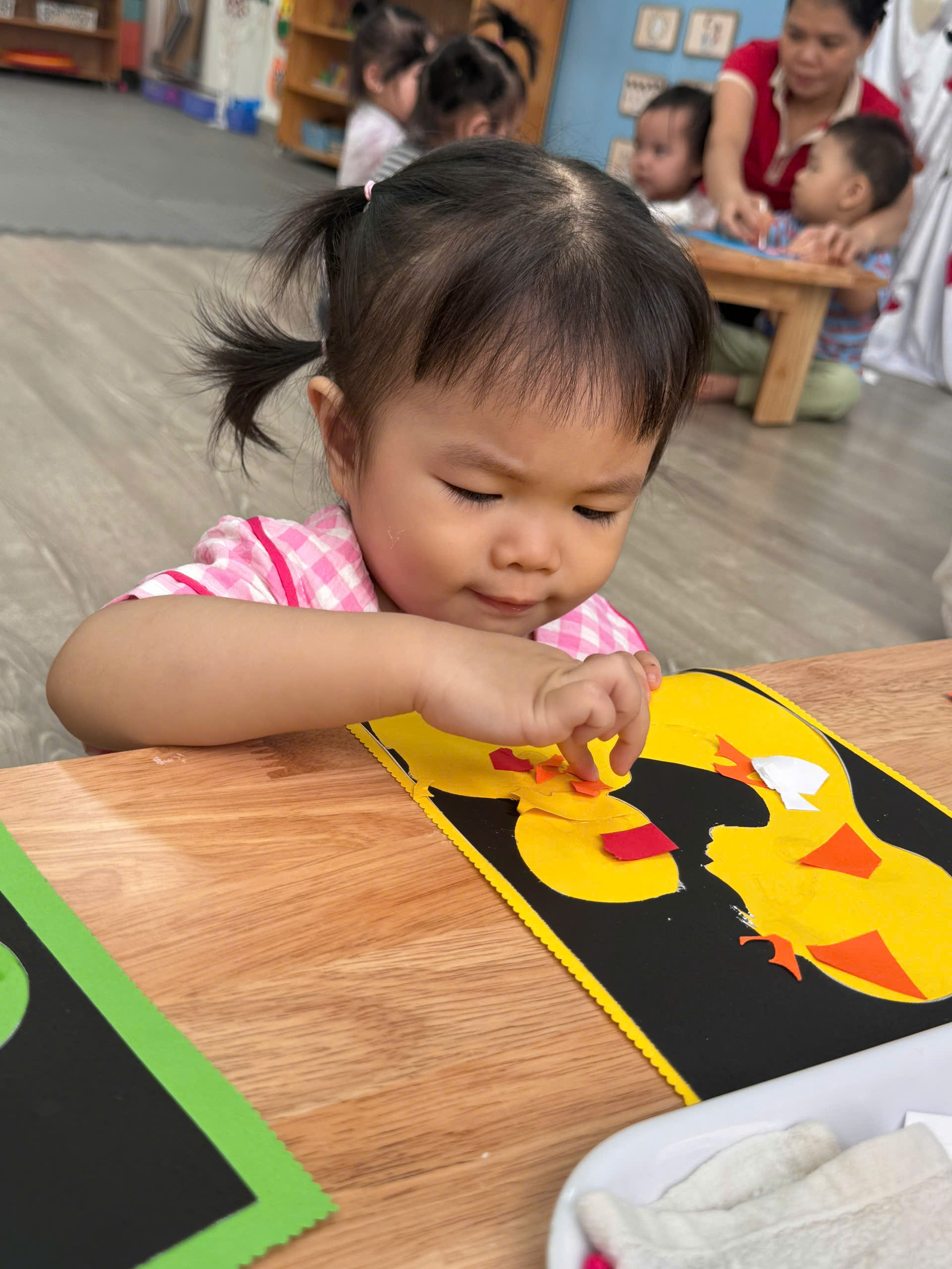 A child painting on a tableAI-generated content may be incorrect.
