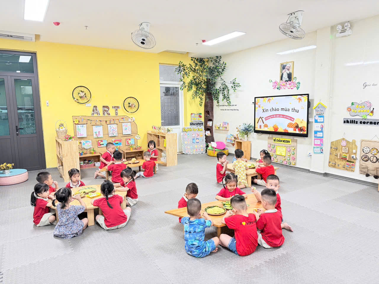 A group of children sitting in a classroomAI-generated content may be incorrect.